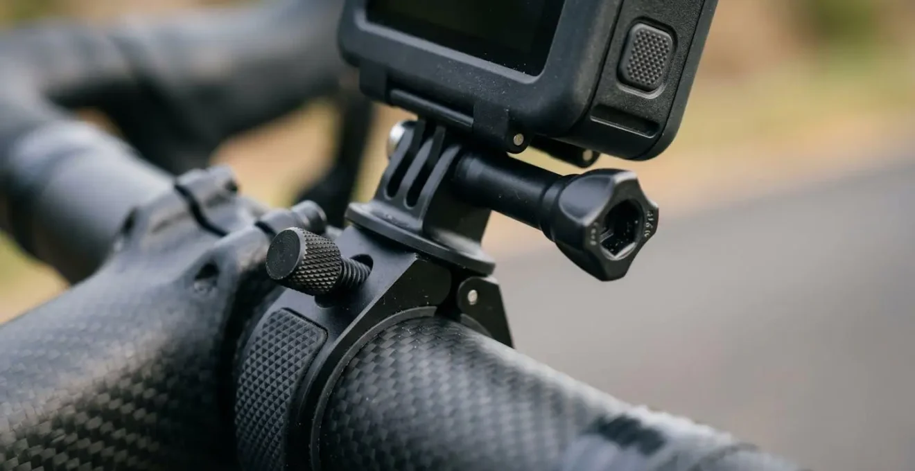 Close-up detail of bicycle-mounted camera technology capturing road perspective