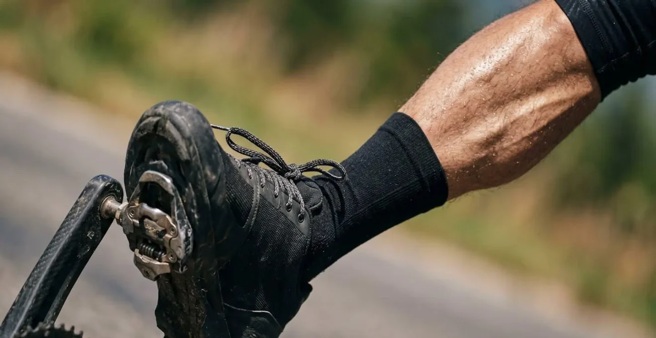Close-up view of cycling power meter and heart rate sensor during intense climb training