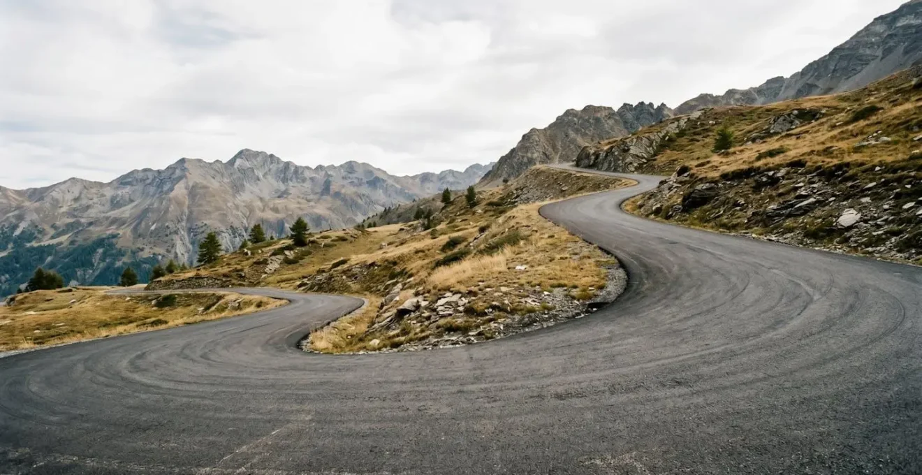 Steep mountain road gradient showing vertical ascent challenge for endurance cyclists